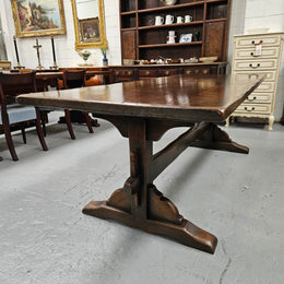 Fabulous dark oak stretcher base dining table. Comfortably sits 8 people. It has been sourced from France and is in good original detailed condition.