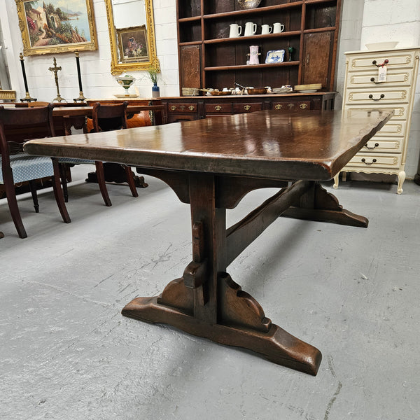 Fabulous dark oak stretcher base dining table. Comfortably sits 8 people. It has been sourced from France and is in good original detailed condition.