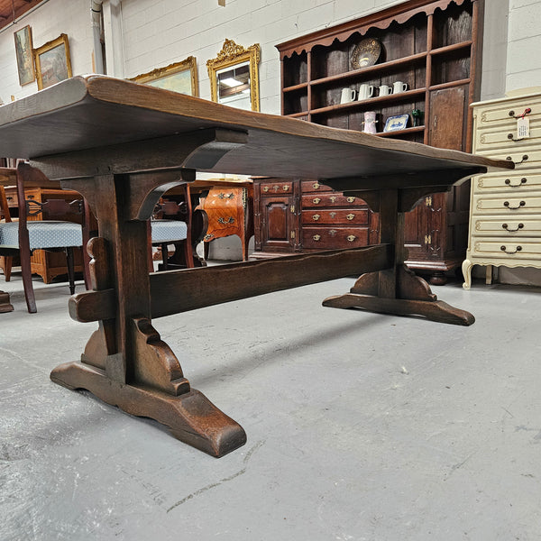 Fabulous dark oak stretcher base dining table. Comfortably sits 8 people. It has been sourced from France and is in good original detailed condition.