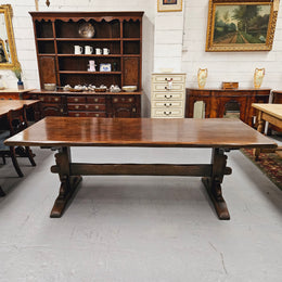 Fabulous dark oak stretcher base dining table. Comfortably sits 8 people. It has been sourced from France and is in good original detailed condition.