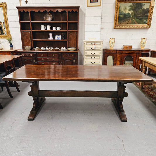 Fabulous dark oak stretcher base dining table. Comfortably sits 8 people. It has been sourced from France and is in good original detailed condition.