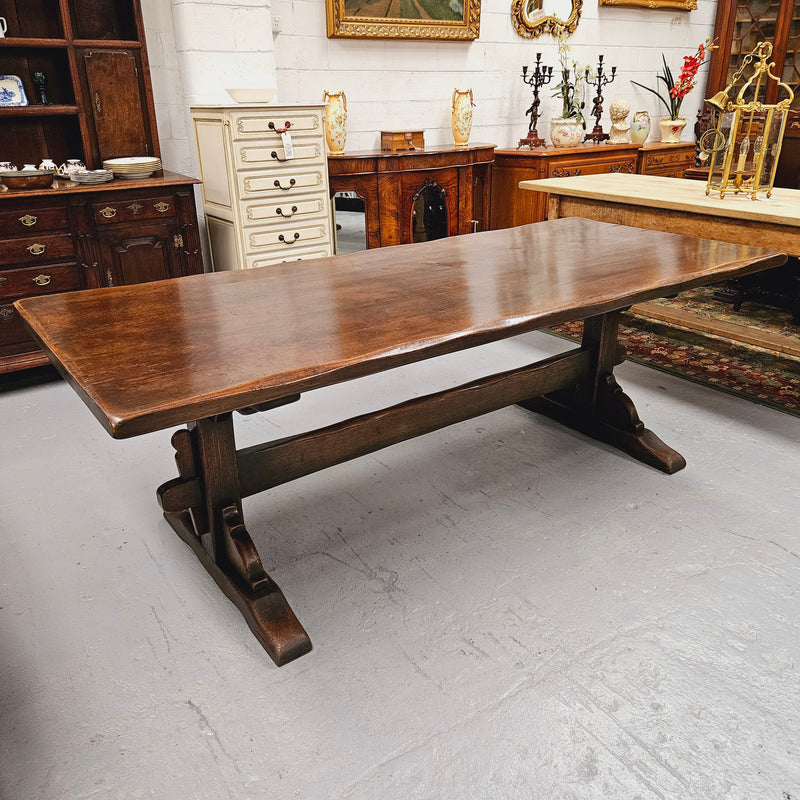 Fabulous dark oak stretcher base dining table. Comfortably sits 8 people. It has been sourced from France and is in good original detailed condition.