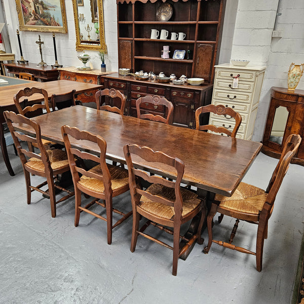 Fabulous dark oak stretcher base dining table. Comfortably sits 8 people. It has been sourced from France and is in good original detailed condition.