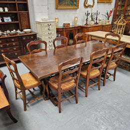 Fabulous dark oak stretcher base dining table. Comfortably sits 8 people. It has been sourced from France and is in good original detailed condition.