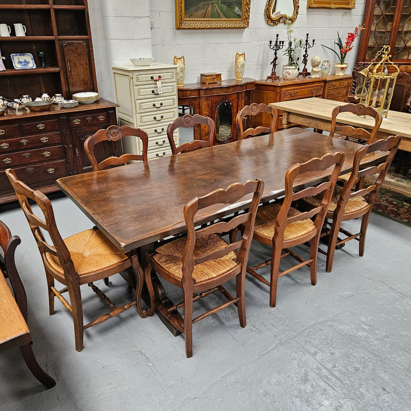 Fabulous dark oak stretcher base dining table. Comfortably sits 8 people. It has been sourced from France and is in good original detailed condition.