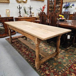 Raw refectory French Oak dining table of pleasing narrow proportions. It has been sourced from France and is in good original condition.