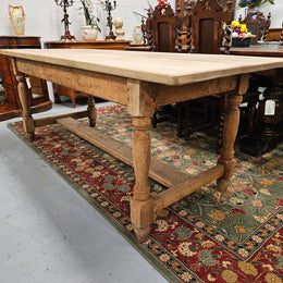 Raw refectory French Oak dining table of pleasing narrow proportions. It has been sourced from France and is in good original condition.