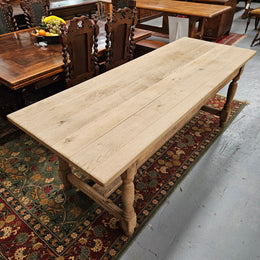 Raw refectory French Oak dining table of pleasing narrow proportions. It has been sourced from France and is in good original condition.
