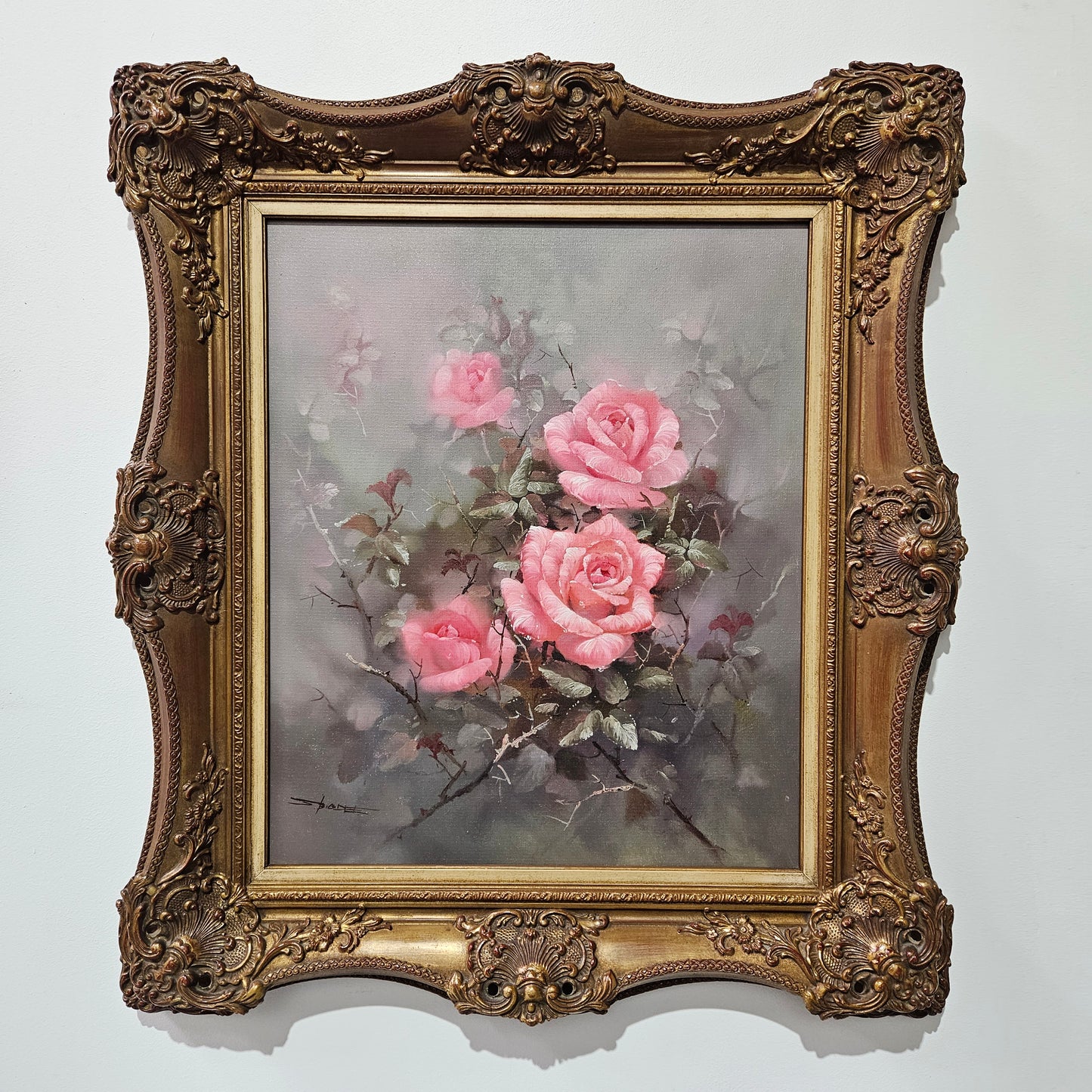 Sourced from France a stunning signed oil on canvas still life of pink roses. In its original frame and in good original detailed condition. 