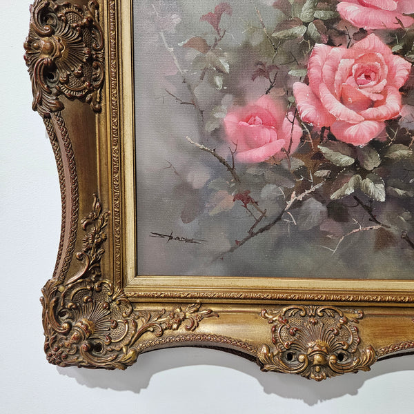 Sourced from France a stunning signed oil on canvas still life of pink roses. In its original frame and in good original detailed condition. 