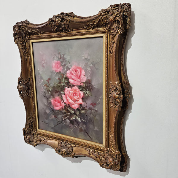 Sourced from France a stunning signed oil on canvas still life of pink roses. In its original frame and in good original detailed condition. 