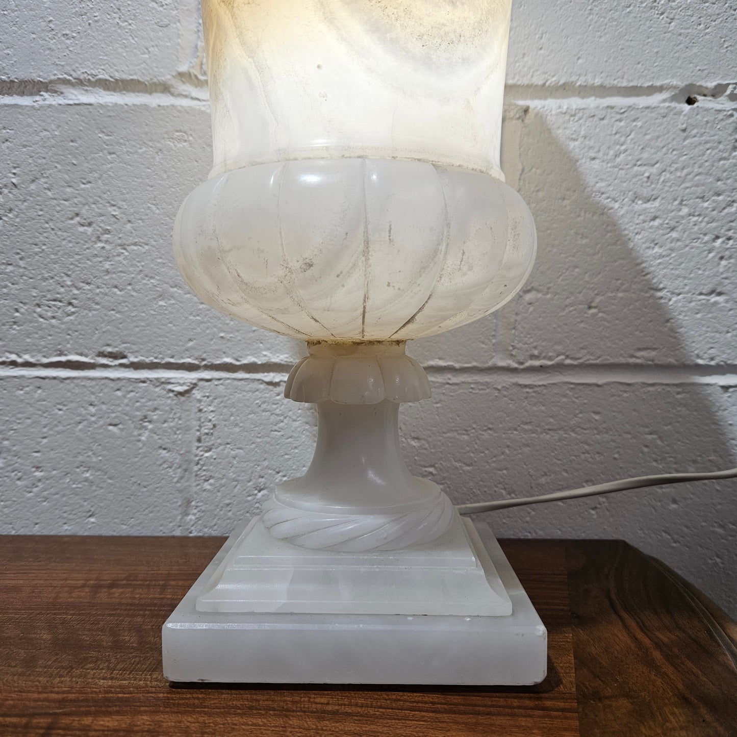 Elegant French alabaster urn lamp that has been rewired to Australian standards. In working condition and in good original detailed condition. Please view photos as they help form part of the description. 