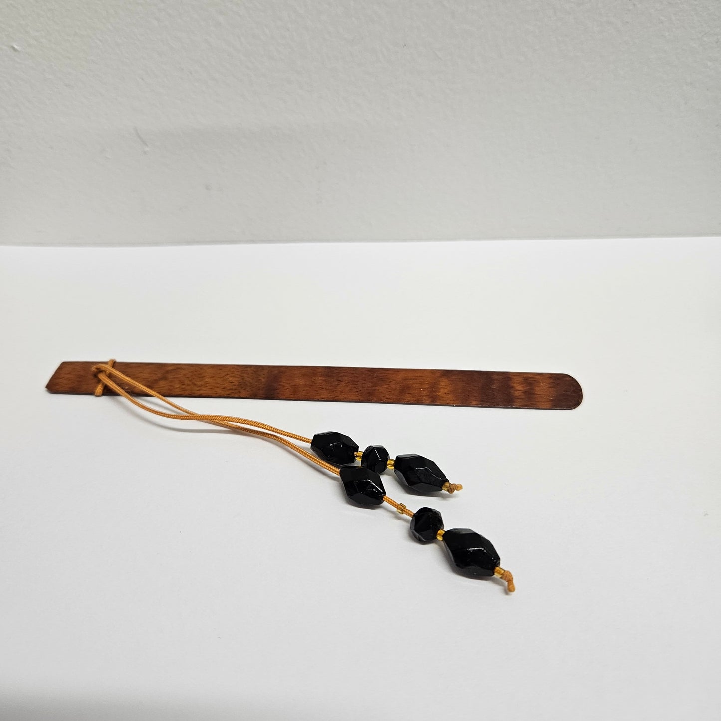 Unusual Fiddleback Blackwood & Jet Beads Book Mark.  In good original condition. Please view photos as they form part of the description. 