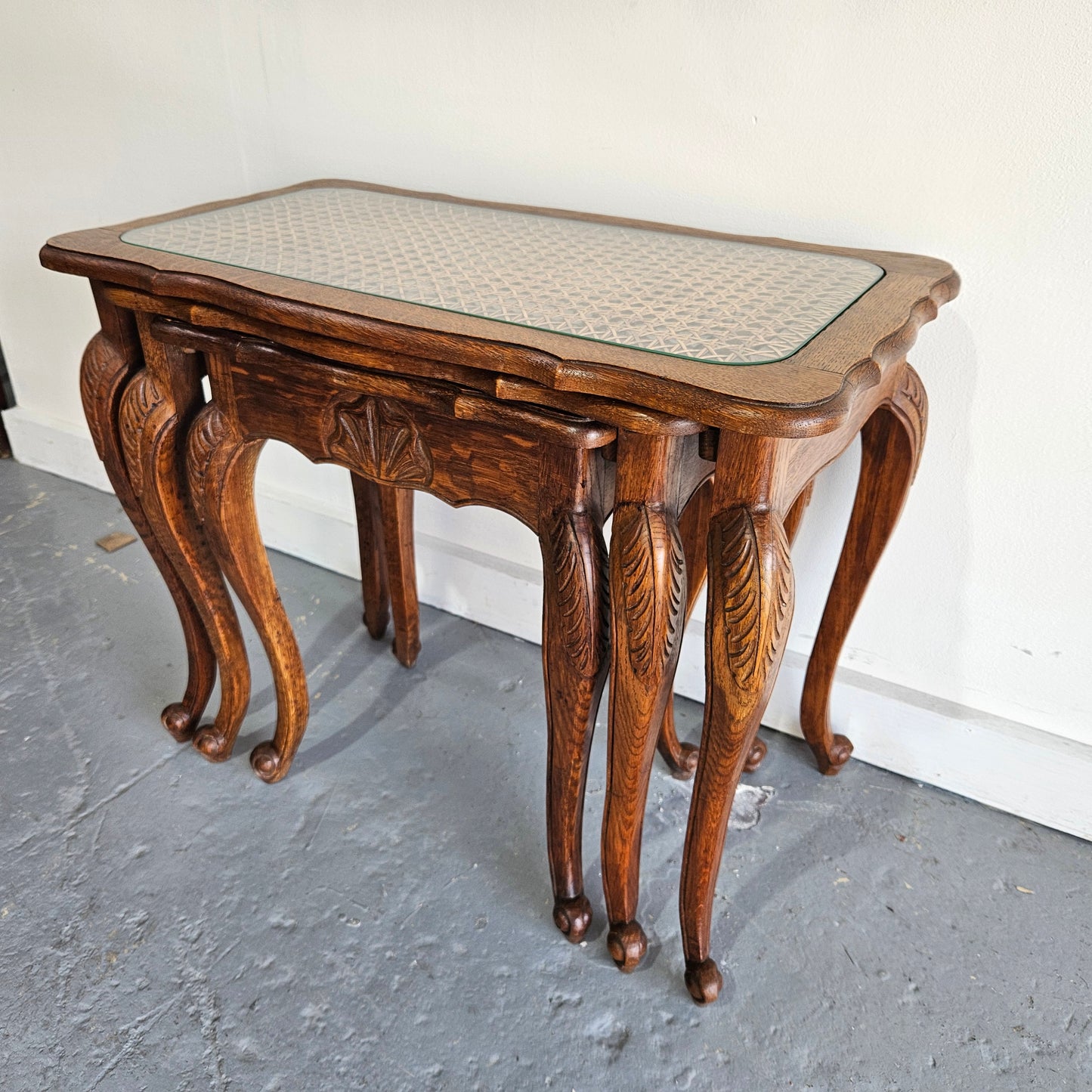 Stunning set of 3 nested table with cane inset and glass top, in great original detailed condition. Please see photos as they form part of the description   