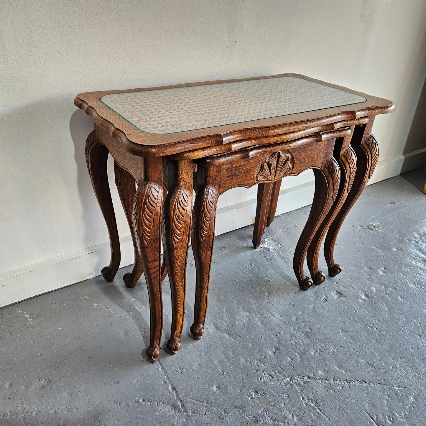 Stunning set of 3 nested table with cane inset and glass top, in great original detailed condition. Please see photos as they form part of the description   