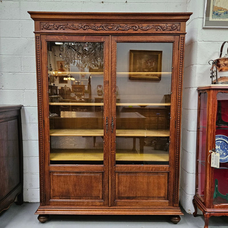 Amazing Louis XVI style two door bookcase with five shelves and beautiful carvings. It is in great original condition. Please see photos as they form part of the description