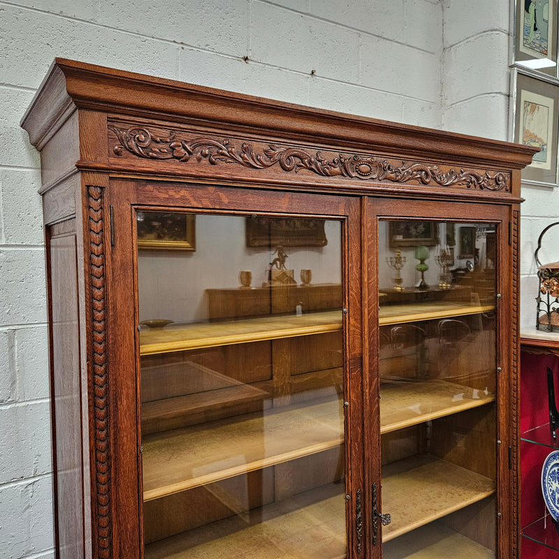 Amazing Louis XVI style two door bookcase with five shelves and beautiful carvings. It is in great original condition. Please see photos as they form part of the description