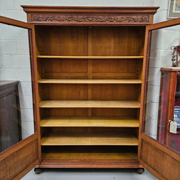 Amazing Louis XVI style two door bookcase with five shelves and beautiful carvings. It is in great original condition. Please see photos as they form part of the description