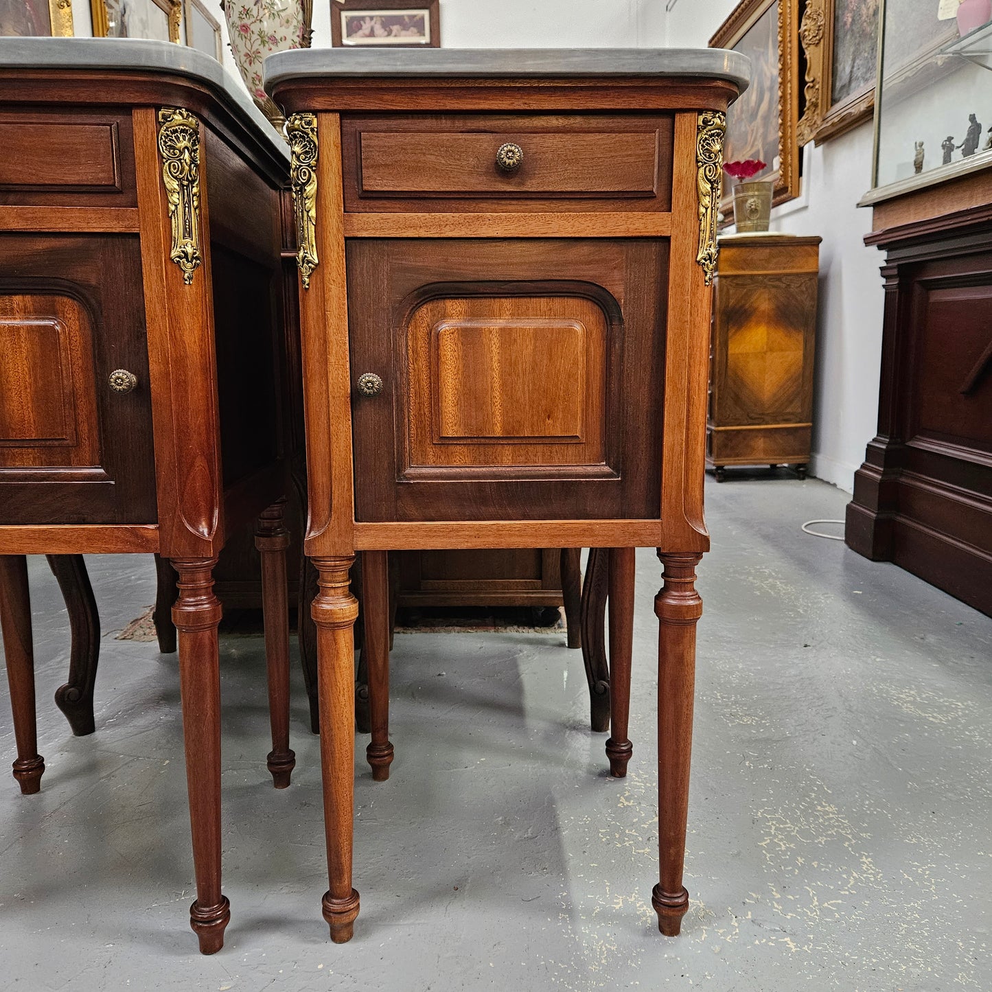 Pair of Mahogany Louis XVI Style Marble Top Bedside Cabinets