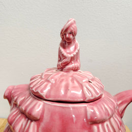 Pretty pink dainty lady English tea pot. There is a chip on the rim of lid, please see photos as they form part of the description. 
