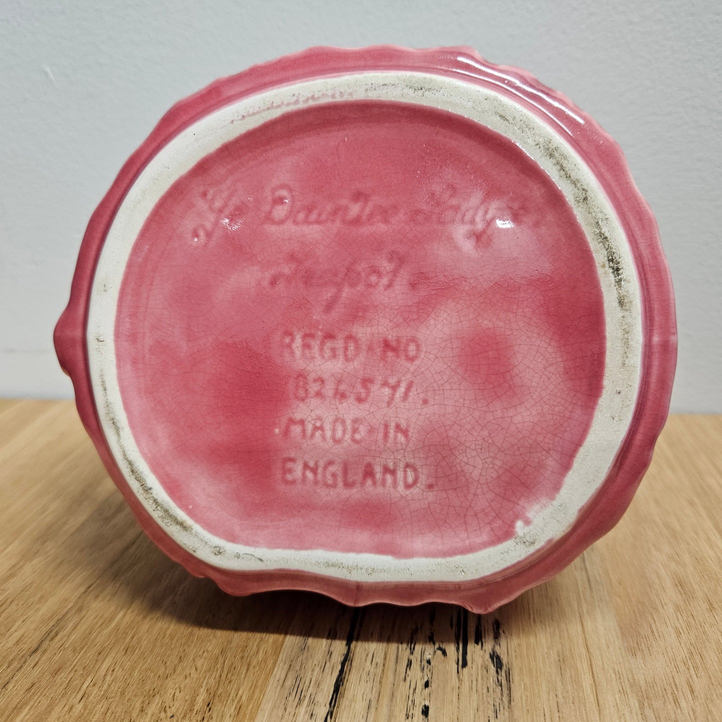 Pretty pink dainty lady English tea pot. There is a chip on the rim of lid, please see photos as they form part of the description. 