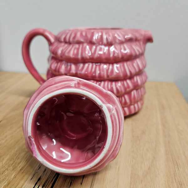 Pretty pink dainty lady English tea pot. There is a chip on the rim of lid, please see photos as they form part of the description. 