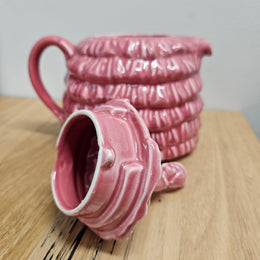 Pretty pink dainty lady English tea pot. There is a chip on the rim of lid, please see photos as they form part of the description. 