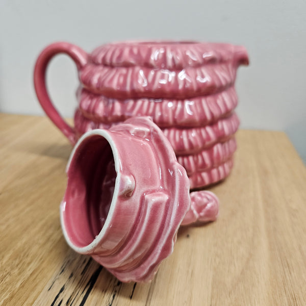 Pretty pink dainty lady English tea pot. There is a chip on the rim of lid, please see photos as they form part of the description. 