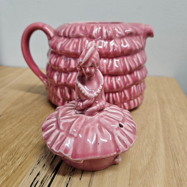 Pretty pink dainty lady English tea pot. There is a chip on the rim of lid, please see photos as they form part of the description. 