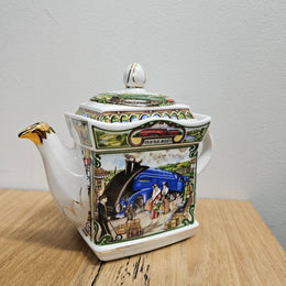 Vintage James Sadler Teapot "Golden Age of Travel" Steam Train Journeys, in good original condition. Please view photos as they form part of the description.