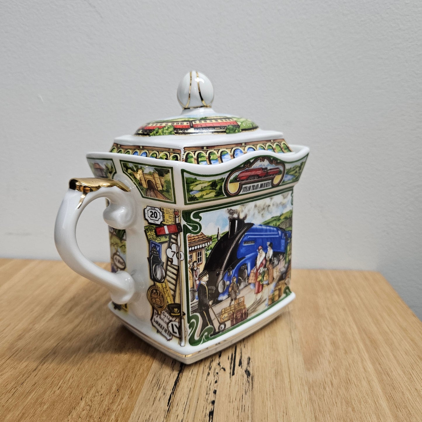 Vintage James Sadler Teapot "Golden Age of Travel" Steam Train Journeys, in good original condition. Please view photos as they form part of the description.