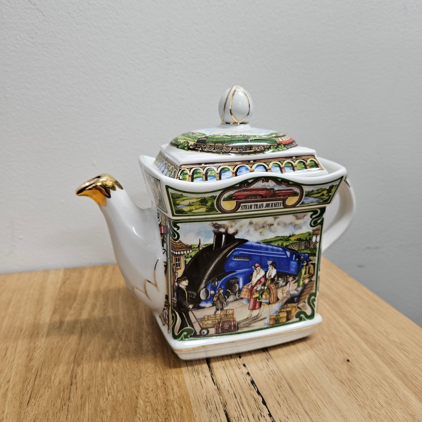 Vintage James Sadler Teapot "Golden Age of Travel" Steam Train Journeys, in good original condition. Please view photos as they form part of the description.