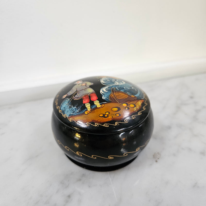 Vintage hand painted Russian trinket box depicting man and boat. In good original condition, please view photos as they help form part of the description. 