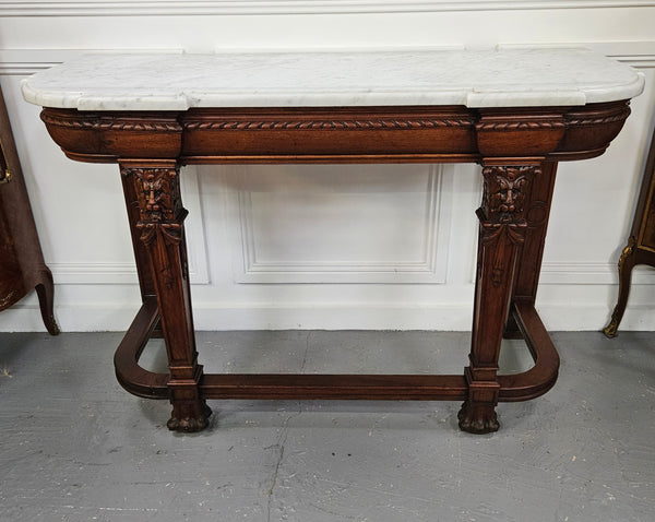 Fabulous French Henry II marble top console table with carved details. It is in good original condition. Please see the photos as they form part of the description.