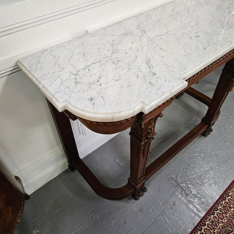 Fabulous French Henry II marble top console table with carved details. It is in good original condition. Please see the photos as they form part of the description.