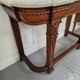 Fabulous French Henry II marble top console table with carved details. It is in good original condition. Please see the photos as they form part of the description.