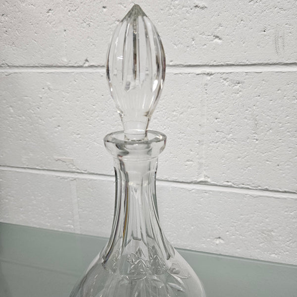 Beautifully shaped cut crystal Decanter and Stopper.  Please see photos as they form part of the description.