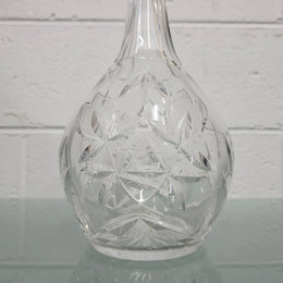 Beautifully shaped cut crystal Decanter and Stopper.  Please see photos as they form part of the description.