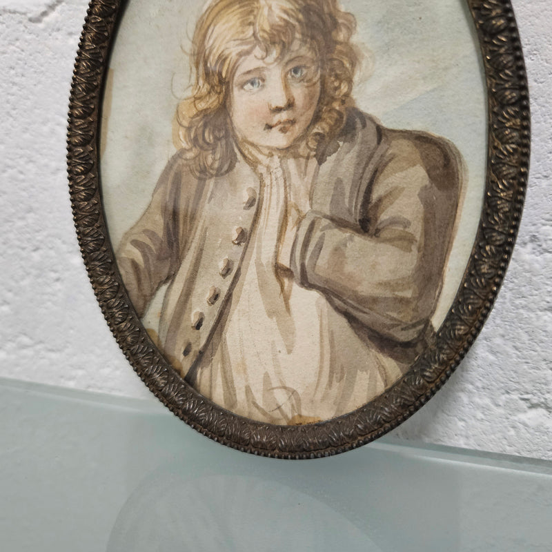 Antique framed miniature water color portrait of young man.  Please see photos as they form part of the description.