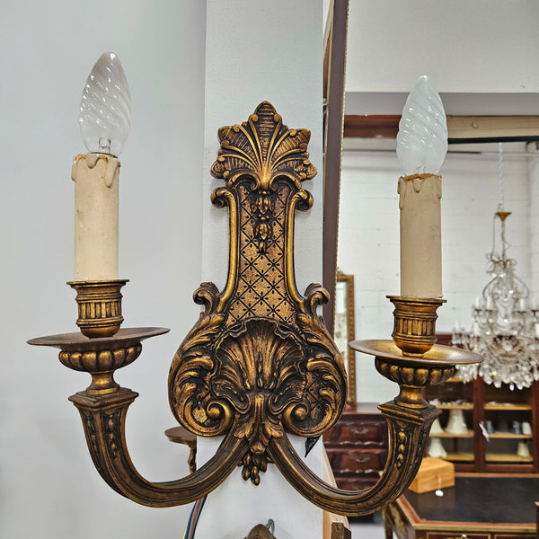 Lovely pair of Louis XV style bronze antique wall sconces lights. They are stunning details and have been rewired to Australian standards. These are in excellent original condition. Please view photos as they form part of the description. 