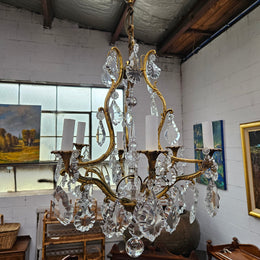 Rare Pair Of Crystal And Gilt Bronze Chandeliers