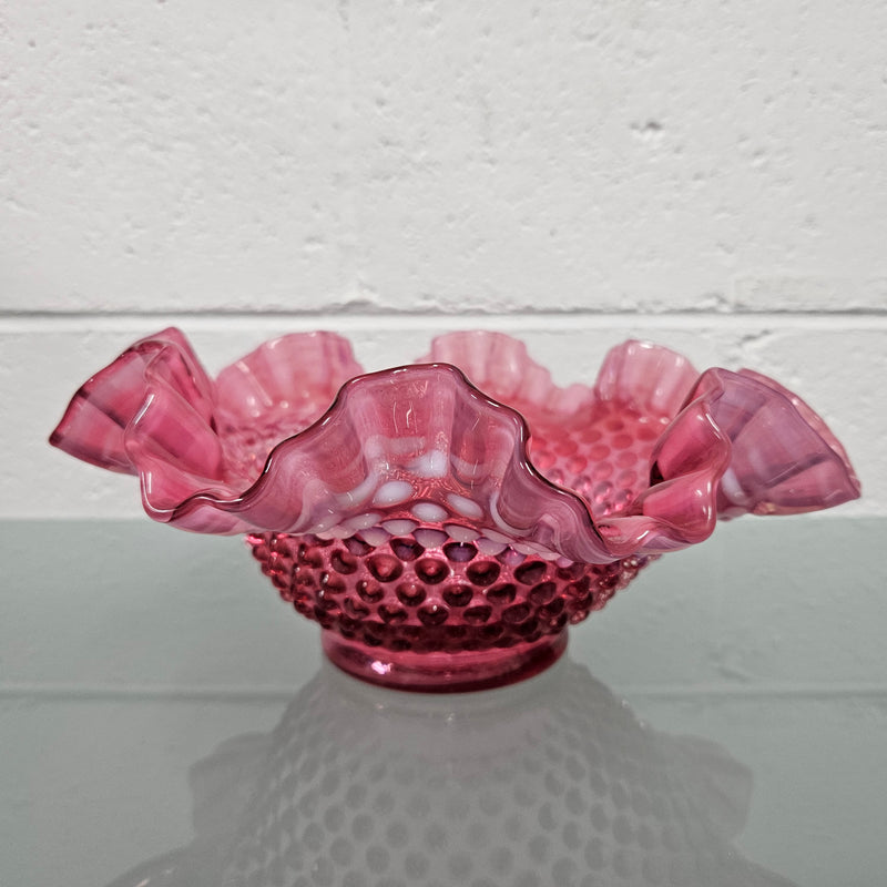 Vintage Large Fenton Cranberry glass bowl with opalescent trim.  In good condition.  Please see photos as  they form part of the description.