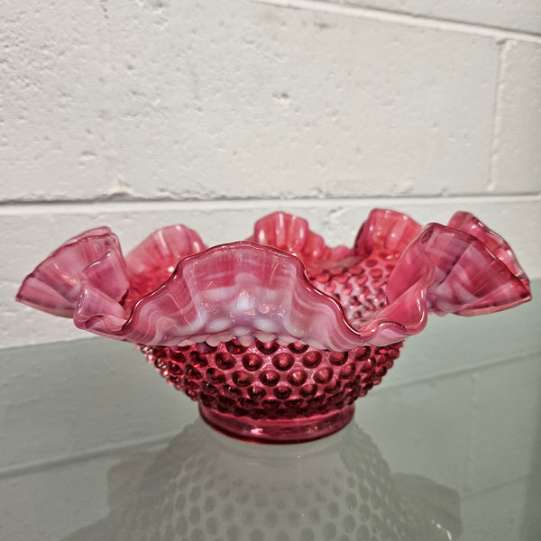 Vintage Large Fenton Cranberry glass bowl with opalescent trim.  In good condition.  Please see photos as  they form part of the description.