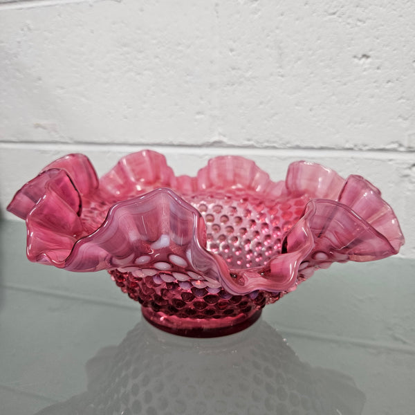 Vintage Large Fenton Cranberry glass bowl with opalescent trim.  In good condition.  Please see photos as  they form part of the description.