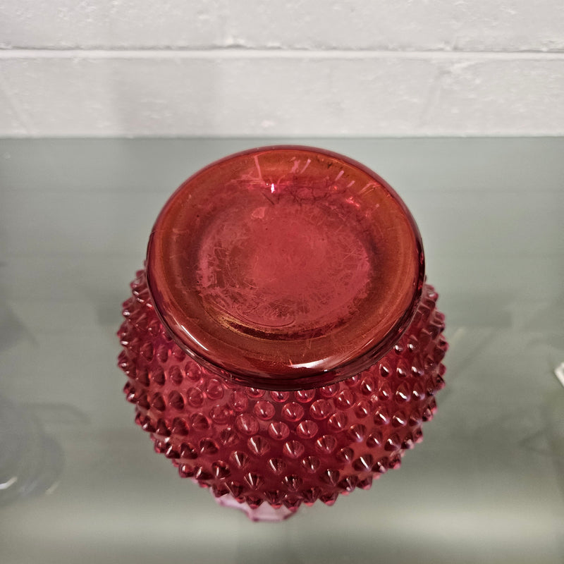 Large vintage Fenton cranberry glass vase with opalescent trim and frilled top. In good condition.  Please see photos as they form part of the description.