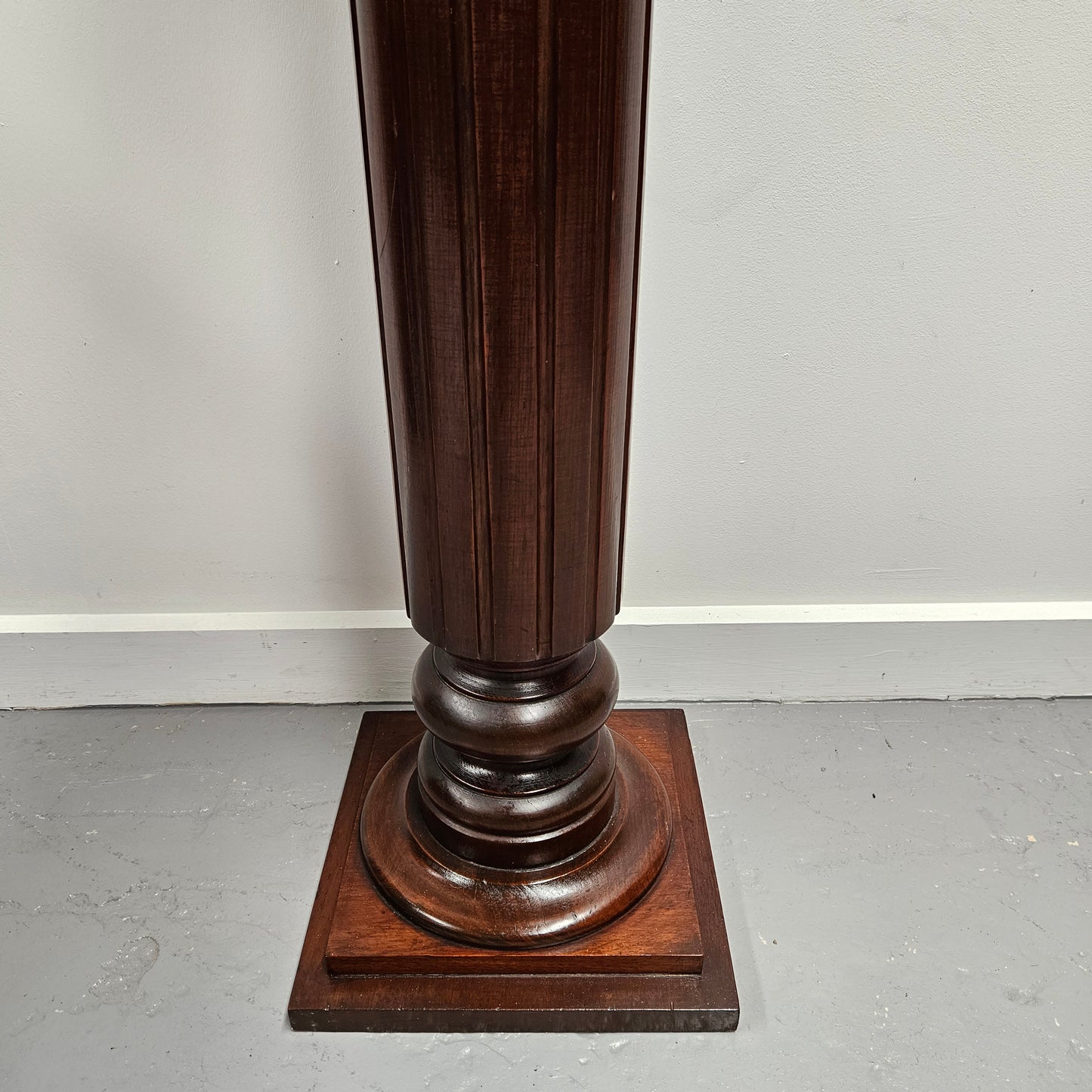 Amazing blackwood gun barrel pedestal with a great design. It is in good original condition. Please see photos as they form part of the description.