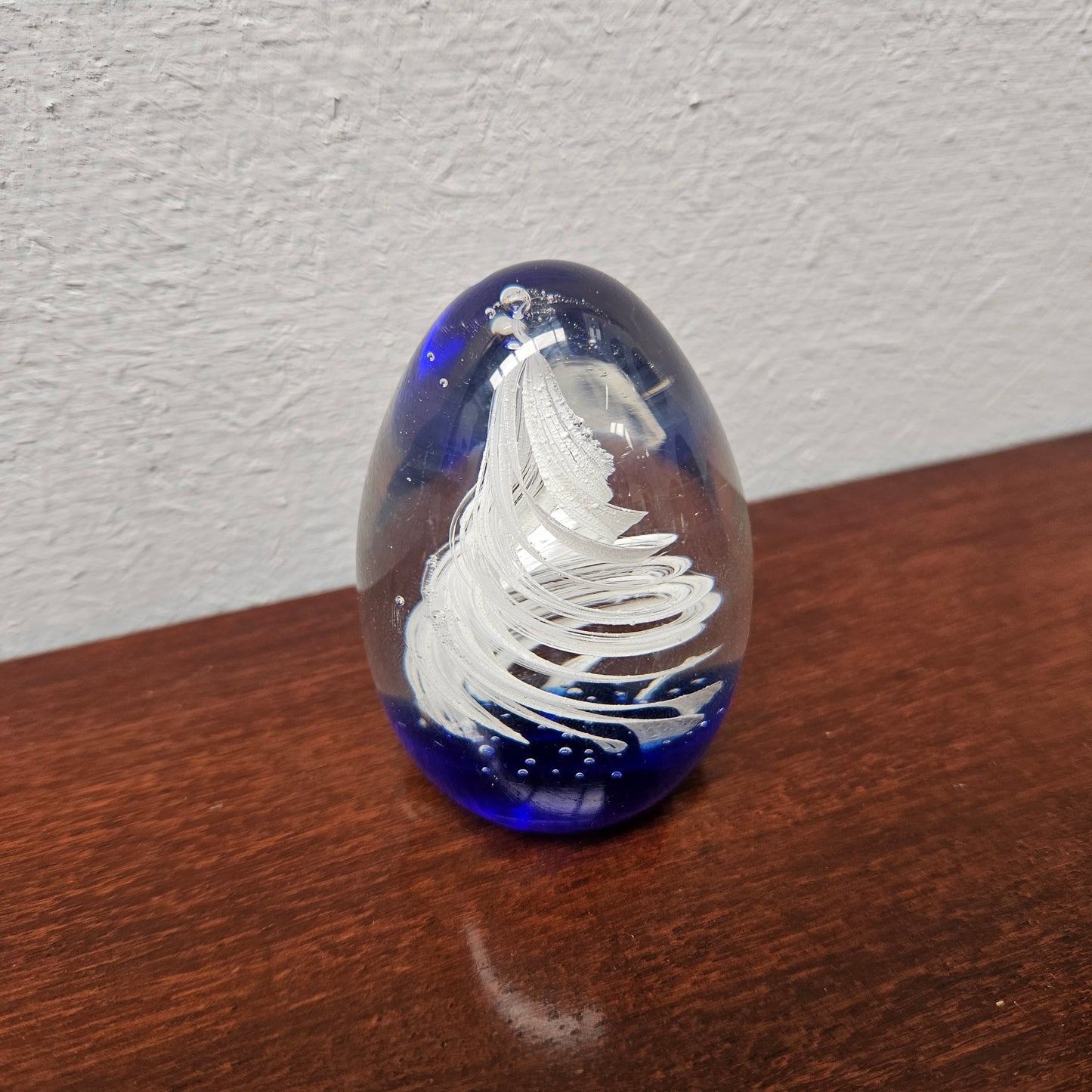 Attractive blue base, white swirl signed paperweight. In good condition. Please see photos as they form part of the description.