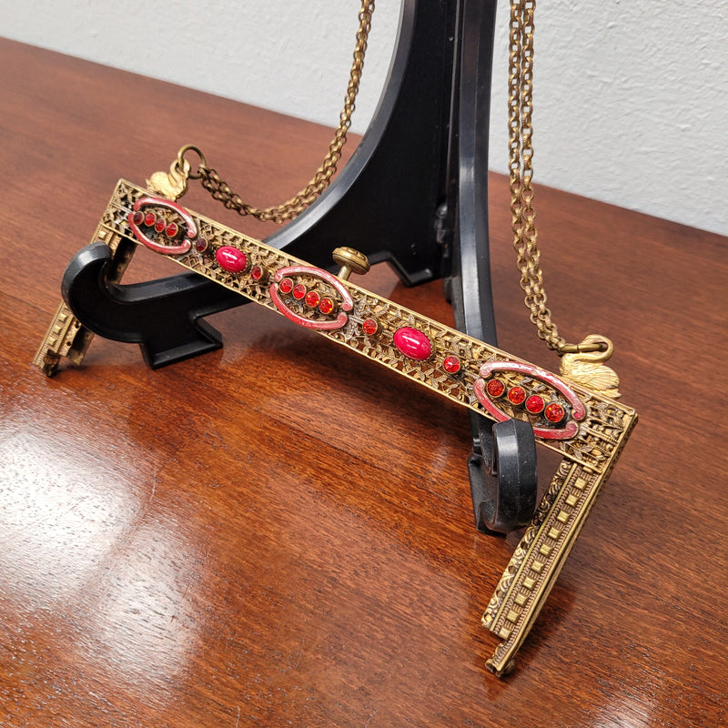 Vintage handbag frame decorated with red enamel, jewels and swans to carry the chain handle. In good original condition. Please see photos as they form part of the description.