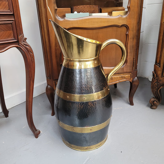 Large Antique copper and brass jug that could be used as an umbrella stand. Sourced from France and is in good original detailed condition. 
