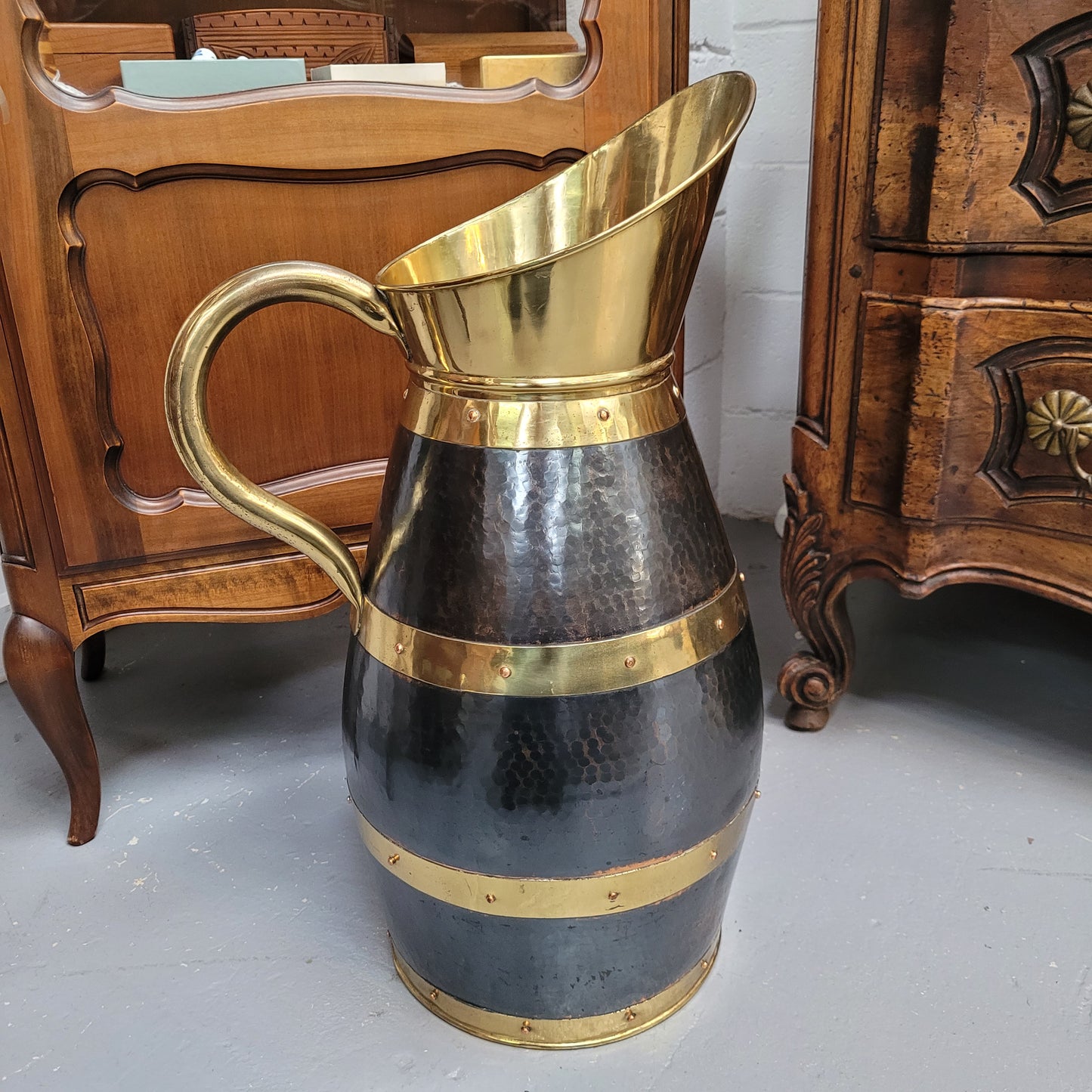 Large Antique copper and brass jug that could be used as an umbrella stand. Sourced from France and is in good original detailed condition. 